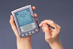 A hand-held personal digital assistant: Click here for full photo caption.