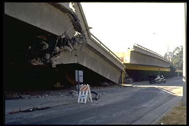 photo of highway bridge damage from earthquake in Northridge, CA