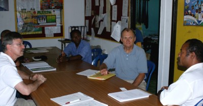 Leonard Jonli (right), Assistant Administrator for Education on Manus, discusses his perspective with (left to right) Ed Lorusso, ACRF Education and Outreach Director; Hymson Waffi, local Officer in Charge for the ACRF site on Manus; and Larry Jones, ACRF Site Manager for the TWP.