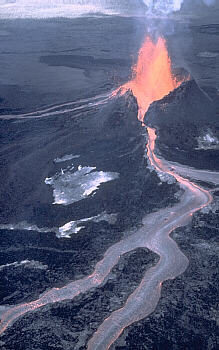 Lava fountain and `a`a flow erupt from Pu`u `O`o vent, Kilauea Volcano