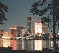 Louisville skyline reflected on river