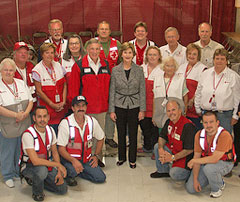 First Lady Mrs. Laura Bush visited the Auchan Red Cross Mass Shelter on Friday, October 3, 2008. She met with volunteers, staff and even helped serve dinner to the shelter residents.  Courtesy Russell Hubbard/American Red Cross.
