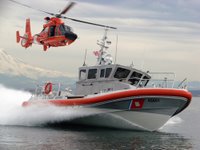 Coast Guard boat and helicopter.