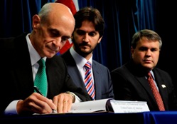 Secretary Chertoff, Slovak Republic Minister of Interior Robert Kalinak and DOJ Deputy Attorney General Mark Filip sign an agreement to enhance cooperation on preventing and combating crime with the Slovak Republic.