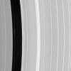 Although the embedded moon Pan is nowhere to be seen, there is a bright clump-like feature visible here, within the Encke Division. Also discernable are periodic brightness variations along the outer (right side) gap edge