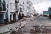 photo of buildings sunk part way into soft ground