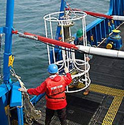 Photo of CTD instrument being retrieved from the water