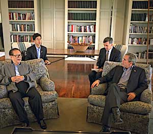 Hosting discussions with President Jiang Zemin of China at the Bush Ranch in Crawford, TX, October 25.