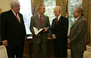 President George W. Bush, Public Printer Bruce James, Archivist Allen Weinstein, and Director of the Office of the Federal Register Ray Mosley in Oval Office for the presentation of the Public Papers of the Presidents.