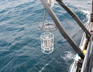 Rosette sampler being lowered into the water