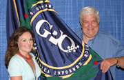 Public Printer Bruce James and Director of Public Relations Veronica Meter unveil the new GPO flag at GPO’s July 4th celebration.