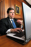 Image of Public Printer Robert C. Tapella with his laptop