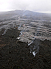 Leading tip of the fissure (steaming area at bottom of photo) that erupted lava minutes after photo was taken.