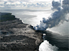 Lava continues to pour into the ocean at Waikupanaha, creating a billowing laze plume. The shiny surface inland from the entry is from the August 10-12 breakouts.