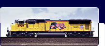 Freight train engine car with American Flag painted on
the side.