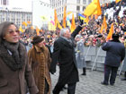 Secretary Powell waves to the Ukrainians gathered for President Viktor Yushchenkos address.