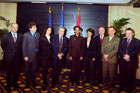 Secretary Rice poses with leading international journalists following her press roundtable in Luxembourg.