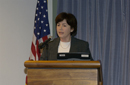 Kathleen B. Cooper,  Under Secretary for Economic Affairs at podium