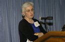 Kathleen Abraham at podium