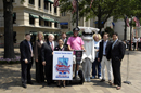 Deputy Secretary David A. Sampson poses for photos during celebration for National Tourism Week