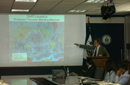 Curt Barrett, Project Manager, International Activities Office, National Weather Service speaks at podium