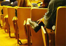 people seated in an auditorium