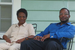 ReGenesis executive director Harold Mitchell with his mother on the front porch of their home