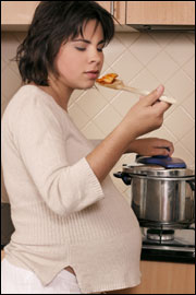 Pregnant Woman Cooking