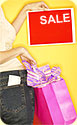 A woman holding a shopping bag and a red sign that says 'sale'.