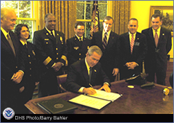 President George W. Bush signing the FY 2005 Homeland Security Appropriations Act