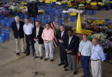 Image of Gutierrez and congressional delegation members at press conference during October 2007 trip. Click for larger image.