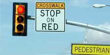 Red Light, Crosswalk Stop on Red sign - Photo courtesy of (http://www.pedbikeimages.org/Dan Burden)