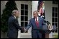 Nominating Rep. Porter Goss, R-Fla., to be the director of the CIA, President George W. Bush extends his hand to him during the Rose Garden announcement Tuesday, Aug. 10, 2004.  White House photo by Joyce Naltchayan