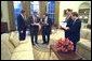 President George W. Bush prepares his State of the Union speech with Dan Bartlett, White House Communications Director, at left,� Mike Gerson, director of Presidential Speechwriting, and speech writers Matthew Scully and John McConnell in the Oval Office Thursday, January 23, 2003.  White House photo by Eric Draper