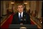 President George W. Bush addresses the nation from the Cross Hall at the White House Monday evening, March 17, 2003.   White House photo by Paul Morse