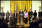 Introduced by Secretary of Labor Elaine Chao (pictured to the immediate right of the President), President George W. Bush addressed the audience during a ceremony for the Recovery and Empowerment Act, which aid charitable efforts, in the East Room Thursday, April 11. White House photo by Eric Draper.