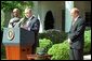 President George W. Bush and Secretary of Education Rod Paige present the 2002 Teacher of the Year award to Chauncey Veatch, right, in the Rose Garden at the White House Wednesday, April 24. Mr. Veatch is a social studies teacher at Coachella Valley High School in Thermal, Calif., White House photo by Paul Morse.