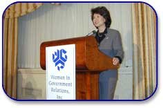 Secretary of Labor Elaine L. Chao at podium during Women in Government Luncheon.