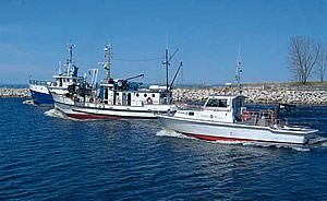 Photo showing NOAA Great Lakes Research vessels LAURENTIAN, SHENAHON, and HURON EXPLORER.