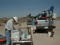 Scientists working with detection equipment