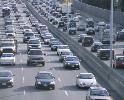 overhead view of traffic on a six lane divided highway