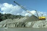 Dredging sediment from Toutle River, Mount St. Helens, Washington