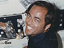 Robert Crippen smiles aboard Space Shuttle Columbia.