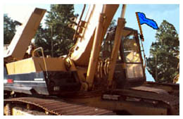Equipment with blue flag attached