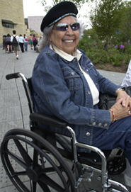 A woman in a wheelchair.