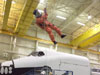 STS-121 Commander Steven Lindsey trains with climbing apparatus