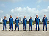 Mission STS-121 crew members pose for the media.