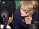 Secretary Spellings is greeted by a student at PS 150 in New York City.