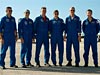 The STS-115 crew poses for a photo at the Shuttle Landing Facility.