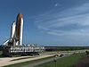 Space shuttle Discovery rolls toward Launch Pad 39A.